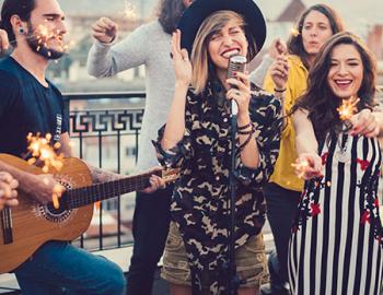 Singer with dancers having fun