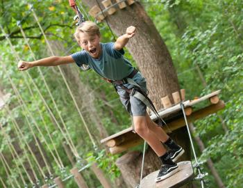 Young boy getting ready to go ziplining