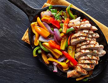 Chicken Fajitas in a cast iron pan