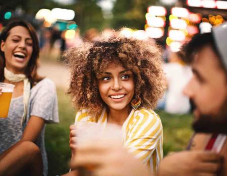 Girl outside at an outdoor concert