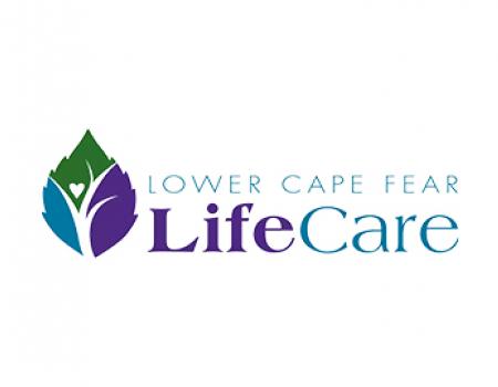 a logo: a green, blue, and purple leaf with white tree branches and a heart inside.