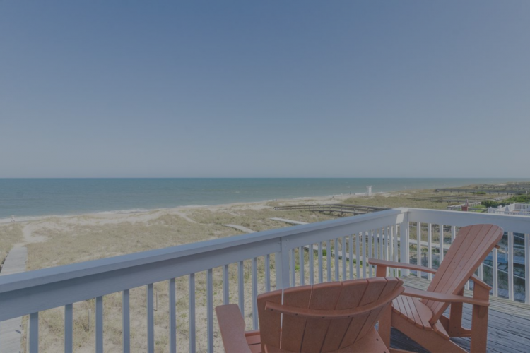 the atlantic beachfront from a vacation rental balcony in kure beach