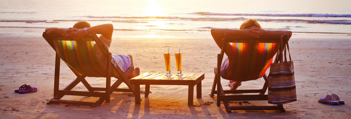 beach chairs at sunset