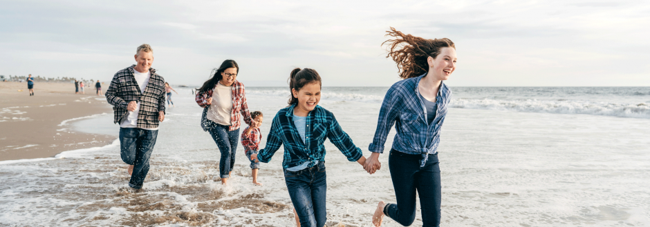 remote learning and working at north carolina beach, family running in waves