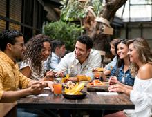 Friends having dinner together