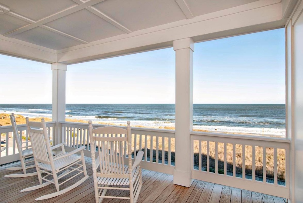 rocking chairs on deck of a carolina shore vacation rental