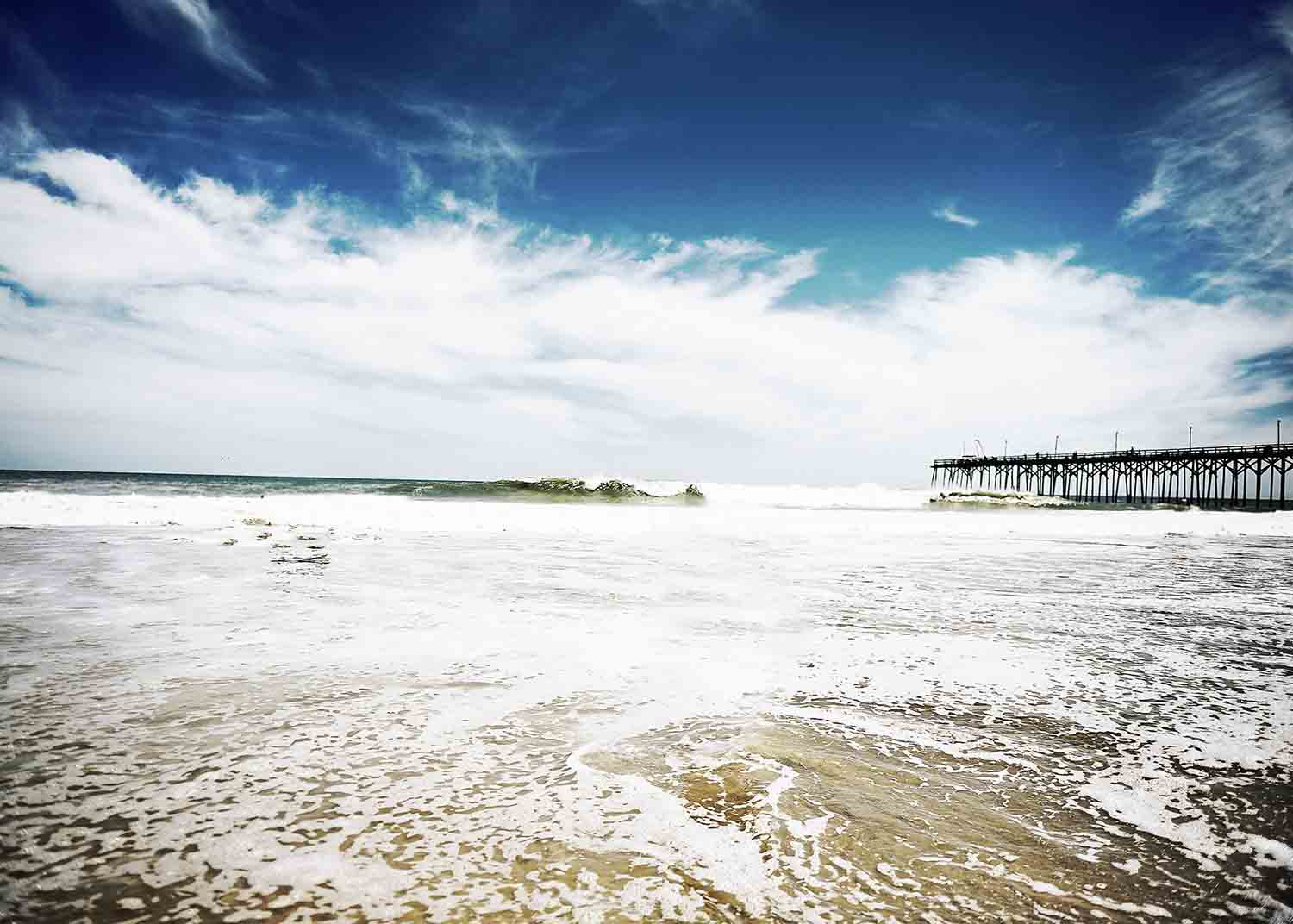 The tide and pier at Carolina Beach