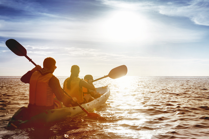 A family kayaks during their Wilmington, NC vacation!