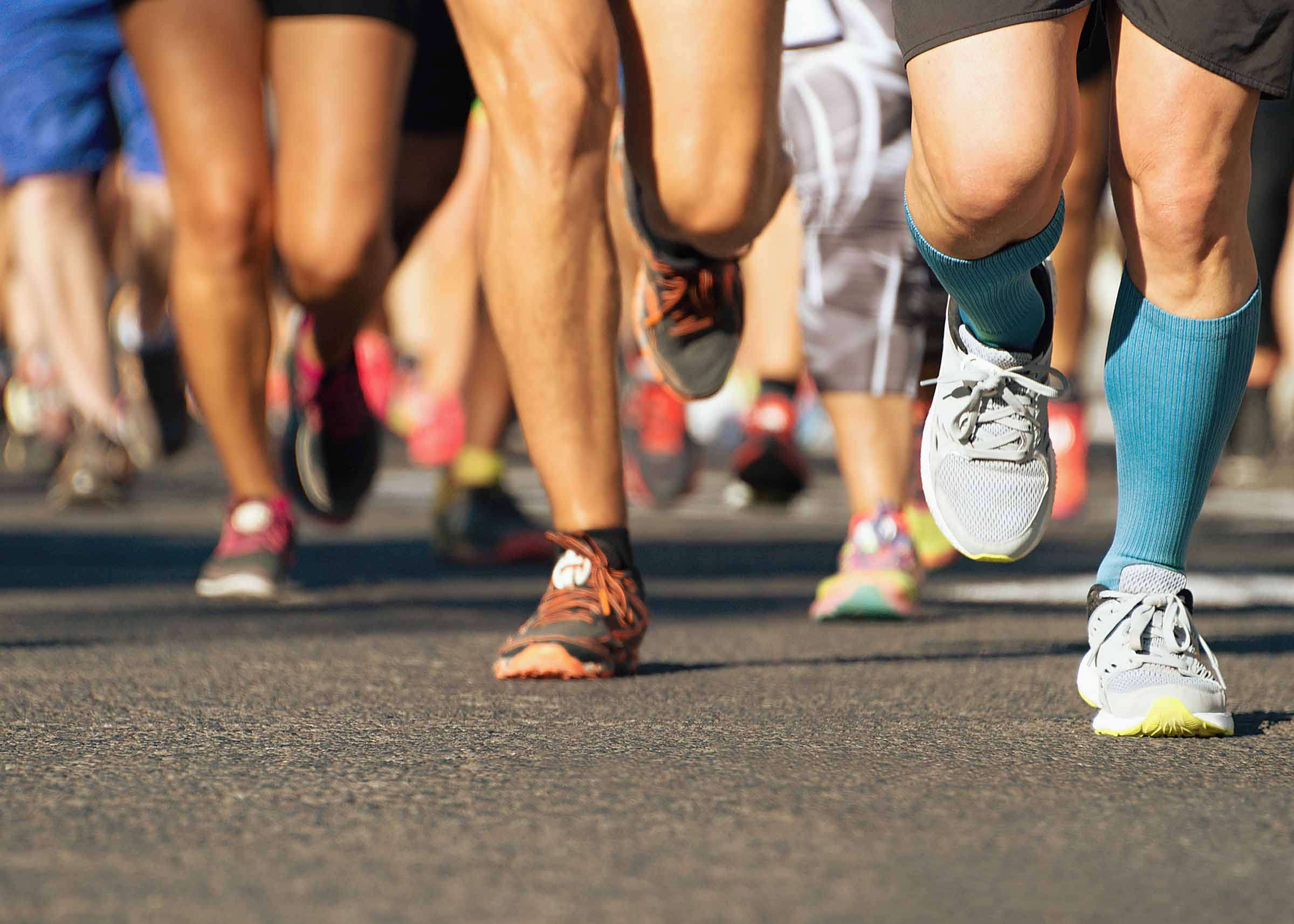 Feet of people racing